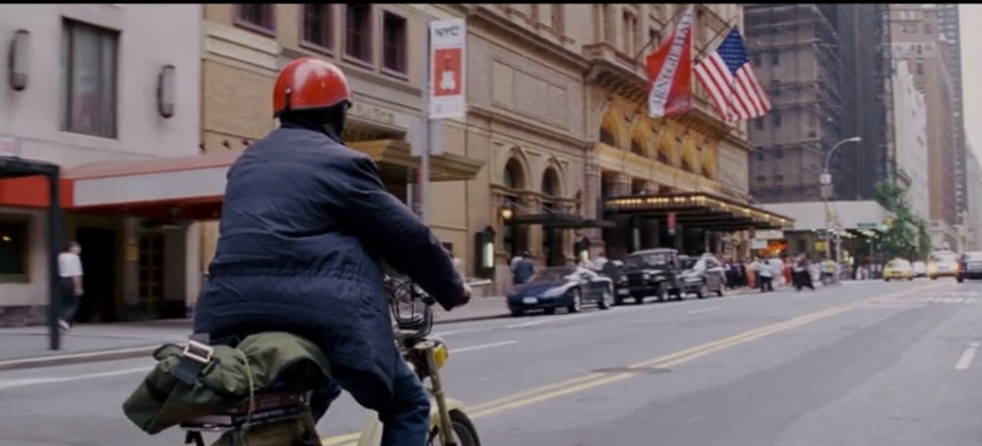 peter parker riding his motorcycle
